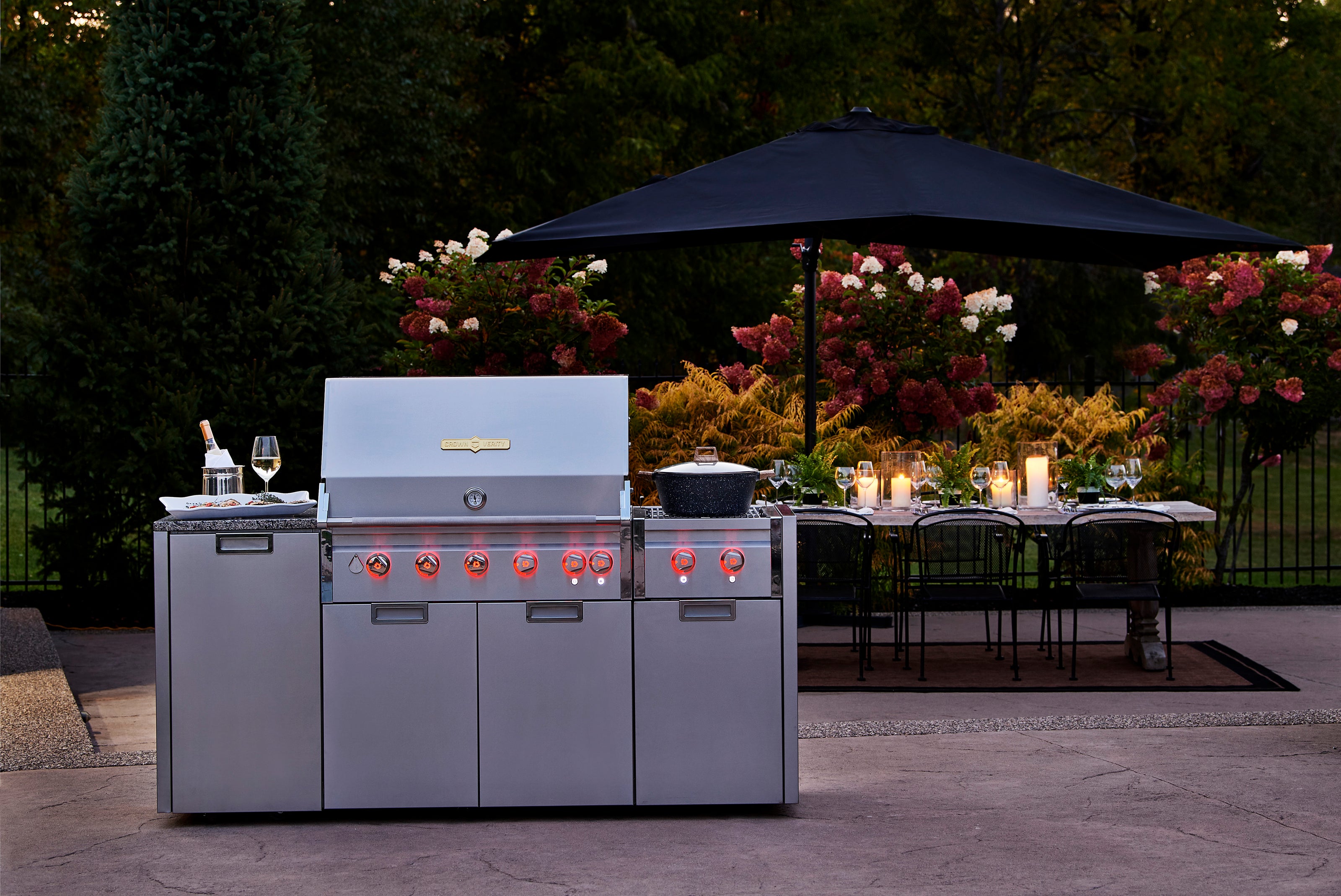 Canadian-made Crown Verity Grills Infinite Series in Backyard Lifestyle Photo at Barbecues Galore