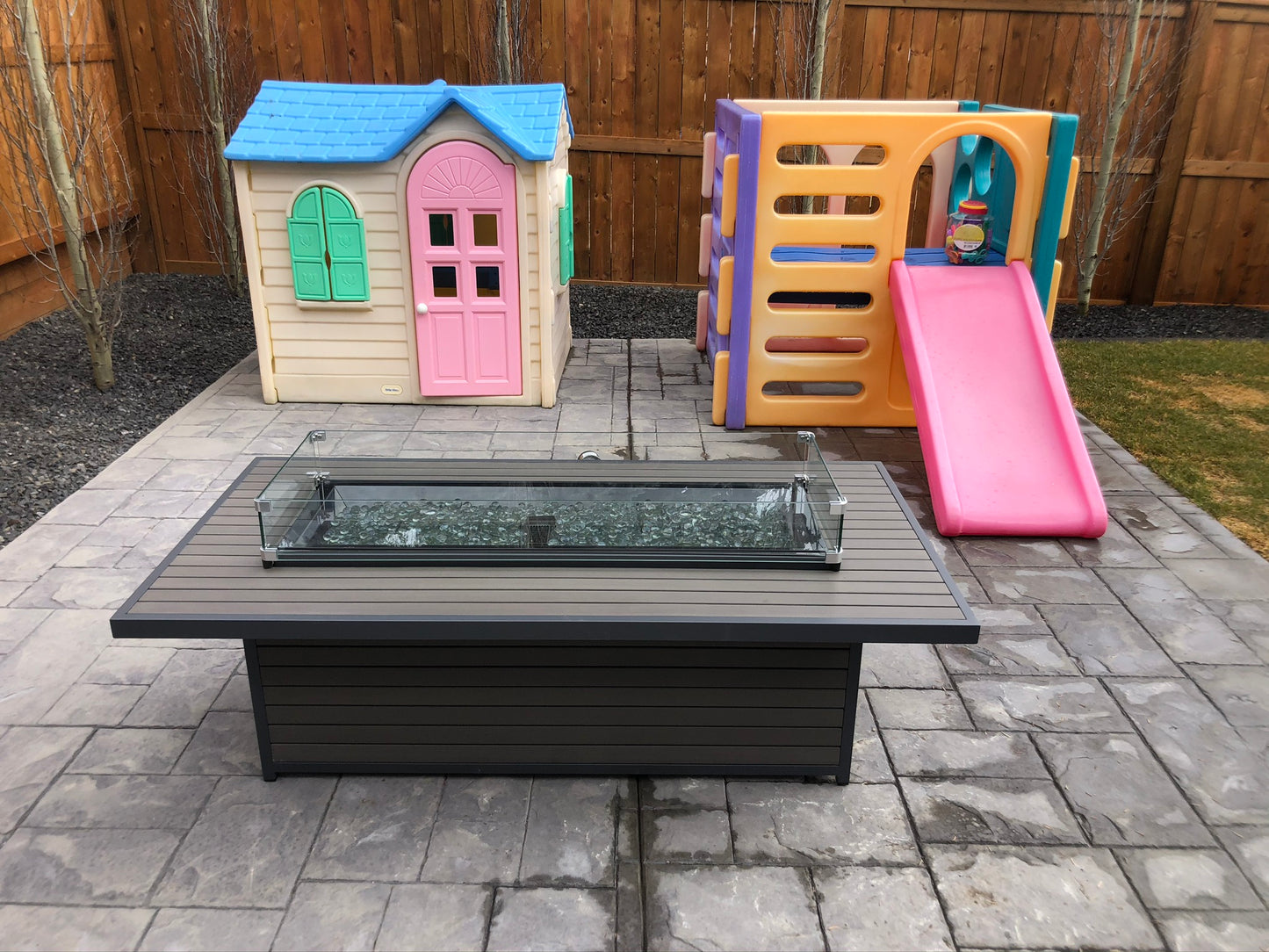 The stunning Outdoor Great Room Brooks Fire Table - Great for adding some extra heat and beautiful aesthetics for your outdoor living space. | Barbecues Galore: Burlington, Oakville, Etobicoke & Calgary