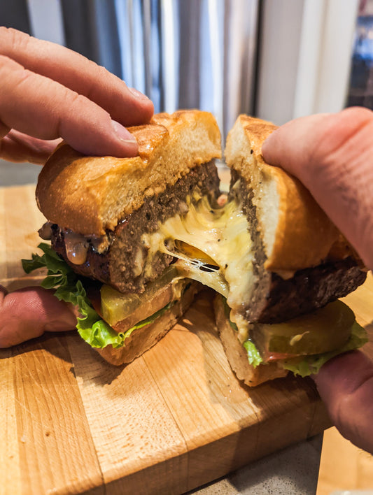 Juicy Lucy Double Cheese-Stuffed Burgers Recipe | July Recipe of the Month