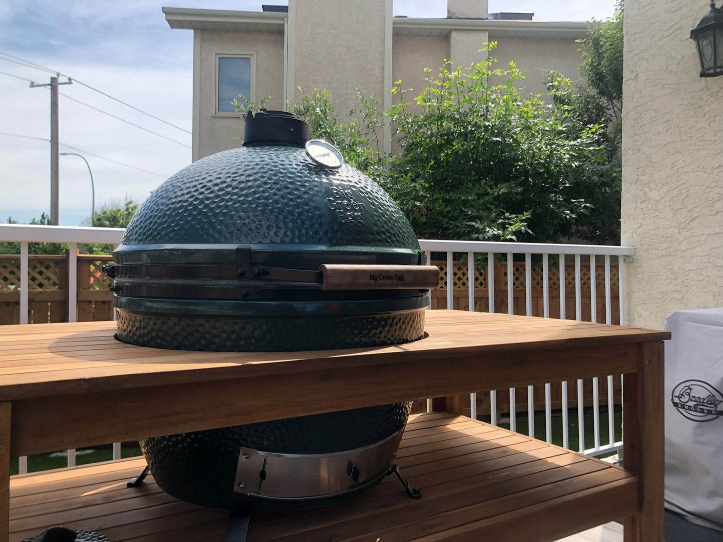 Acacia Wood Table l Barbecues Galore: Burlington, Oakville, Etobicoke & Calgary.  Stop by any of our local stores and we'll get you ready for summer grilling.