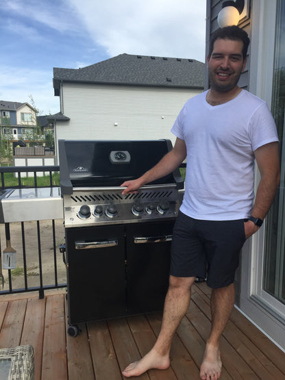 Matthew enjoying his new Napoleon Prestige P500RSIB barbecue.  This made in Canada grill is great for year round grilling.  Get yours this summer for some backyard fun.  Available at Barbecues Galore: Burlington, Oakville, Etobicoke & Calgary