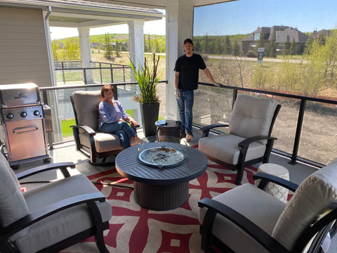 Barbecue Butlers setting up a beautiful round Outdoor GreatRoom Brooks Fire Table | Barbecues Galore: Burlington, Oakville, Etobicoke & Calgary