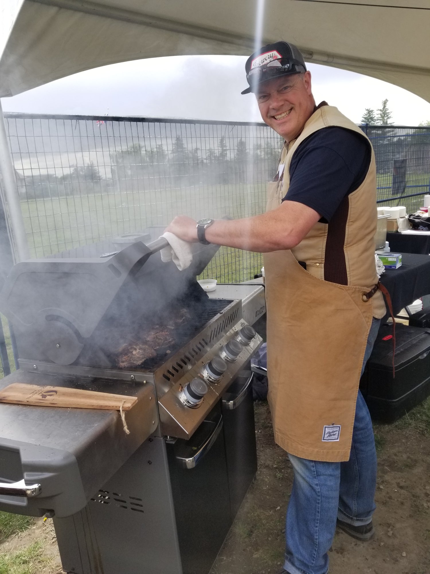 Grilling some delicious meat on the Napoleon Prestige 500.  A great all around BBQ for any scenario.  Barbecues Galore: Burlington, Oakville, Etobicoke & Calgary 