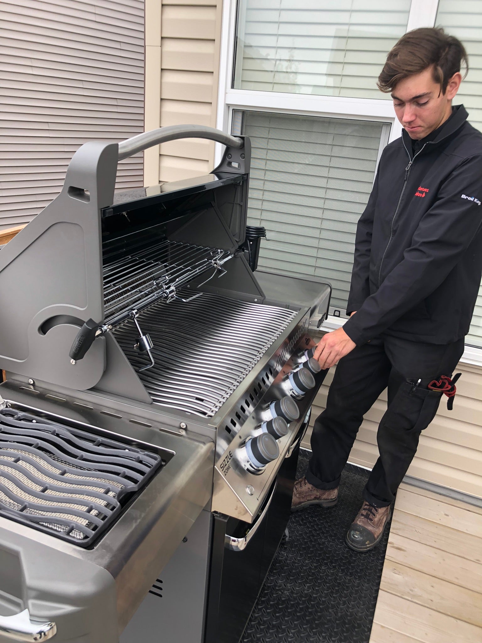 BBQ Butler Jordan placing the Napoleon P500RSIB Black in its new home in time for summer.  Available at Barbecues Galore: Burlington, Oakville, Etobicoke & Calgary